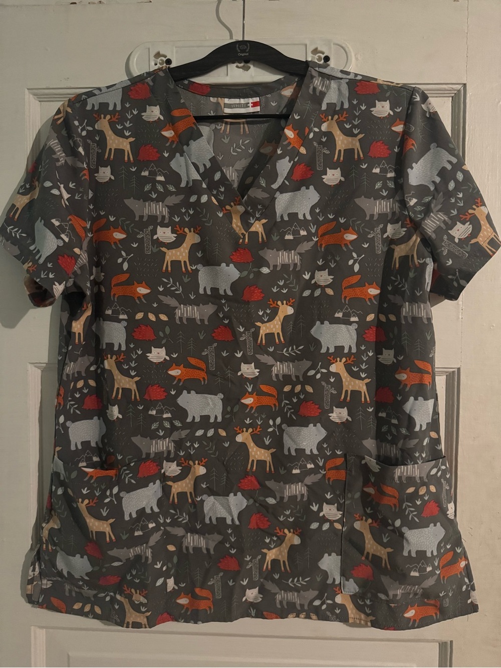 White Cross woman’s size medium woodland creatures scrub top